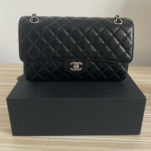 Elegant Black Quilted Shoulder Bag with Silver Accents